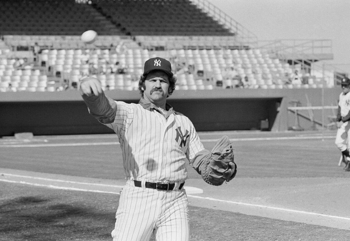 AP_7802240171.jpg New York Yankees catcher, Thurman Munson, reports to spring training camp, Feb. 24, 1978 in Ft. Lauderdale and limbers up his throwing arm during workouts. (AP Photo/Robert H. Houston)